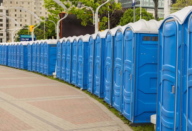 a row of sleek and modern portable restrooms at a special outdoor event in Antelope